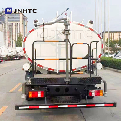 Sinotruck HOWOライト1000lスプリンクラーのトラック4X2水トラック タンク