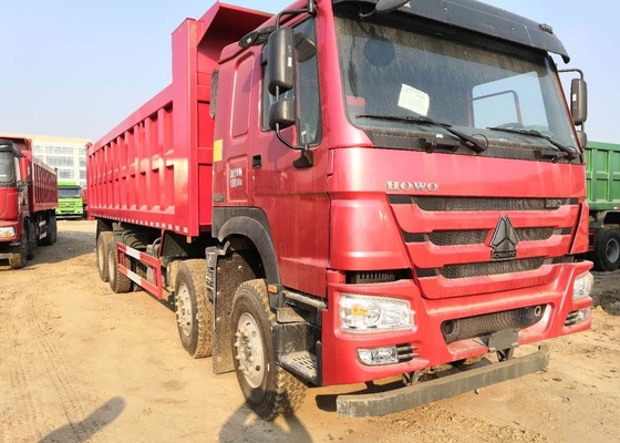 HOWOの371hp赤い色の国際的なダンプ トラックが付いている頑丈な6x4ダンプ トラック装置