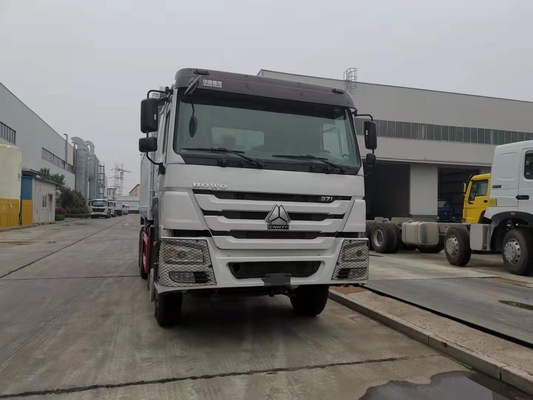 Sinotruk 6x4 10の車輪のボディ プラットホームの転覆の頑丈なダンプ トラック
