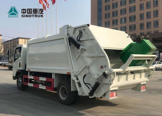 都市クリーニングのためのSinotruk Howo 4*2の軽トラック10CBMの無駄のコンパクターのトラック