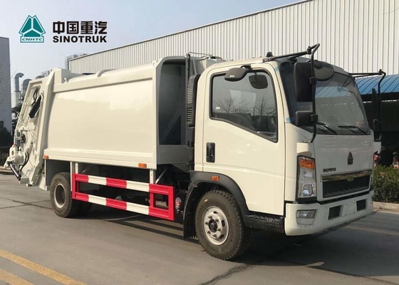 都市クリーニングのためのSinotruk Howo 4*2の軽トラック10CBMの無駄のコンパクターのトラック