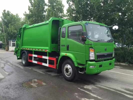 SINOTRUK HOWO 4*2は12m3廃物のコンパクターのトラックを密集させました