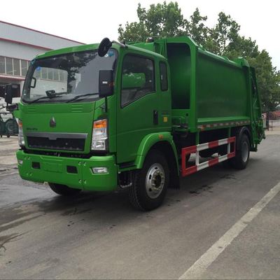 SINOTRUK HOWO 4*2は12m3廃物のコンパクターのトラックを密集させました