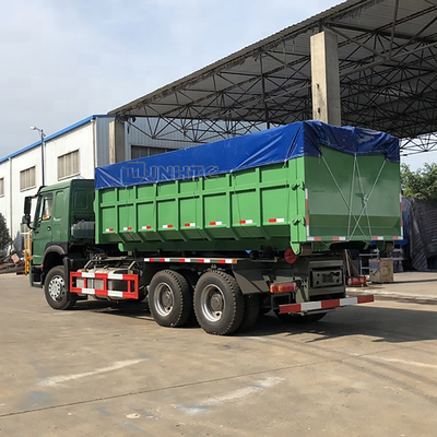 不用な屑屑のためのSINOTRUK HOWO 6x4の利き腕ロールごみ収集車