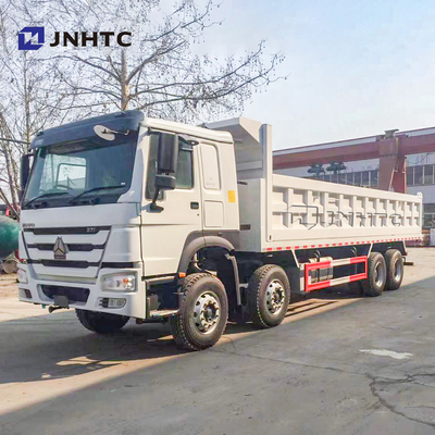 SINOTRUK HOWO 8X4 371hpの取り外し可能な貨物箱のダンプ トラックの平床式トレーラーの皿のダンプカー