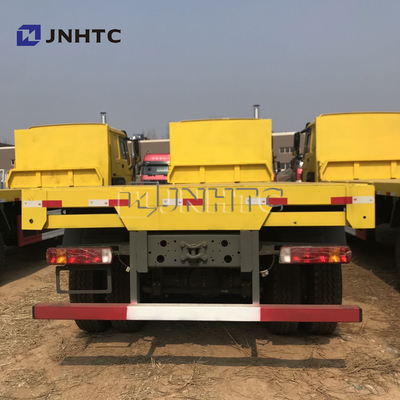SINOTRUK 8*4 22-30のトンの凹面の平面輸送のトラックの掘削機の輸送のトラック