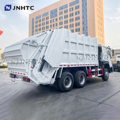 Sinotruk Howo 6x4の移動式廃物のコンパクターのトラックの屑大箱のコレクションの屑16m3 18m3