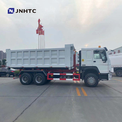 30T LHD Sinotruk 6x4 10はHowoのホックの上昇のごみ収集車を動かす